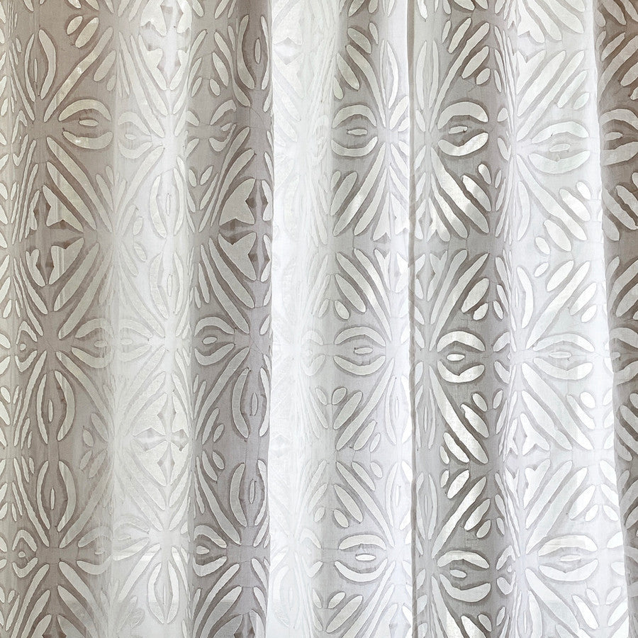 Pair of cotton organza hand stitched appliqué curtains. The white on white curtains with a snow flake pattern are beautiful with the light coming through.