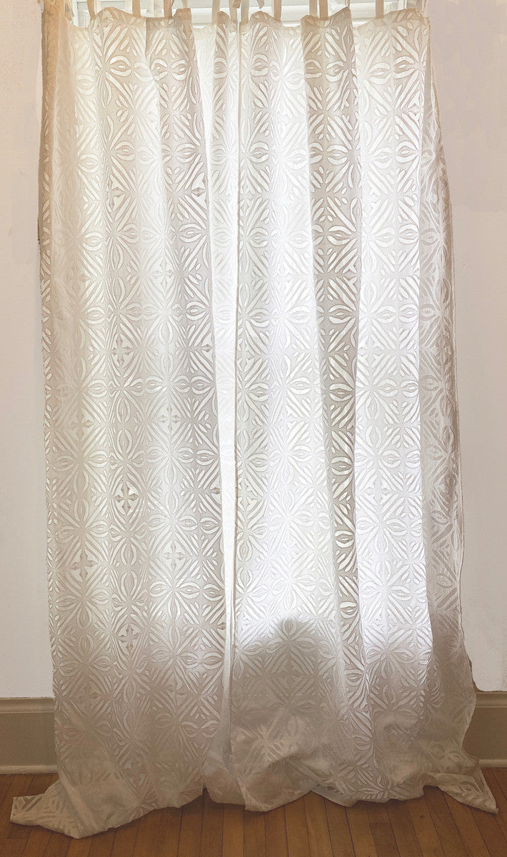 Pair of cotton organza hand stitched appliqué curtains. The white on white curtains with a snow flake pattern are beautiful with the light coming through.