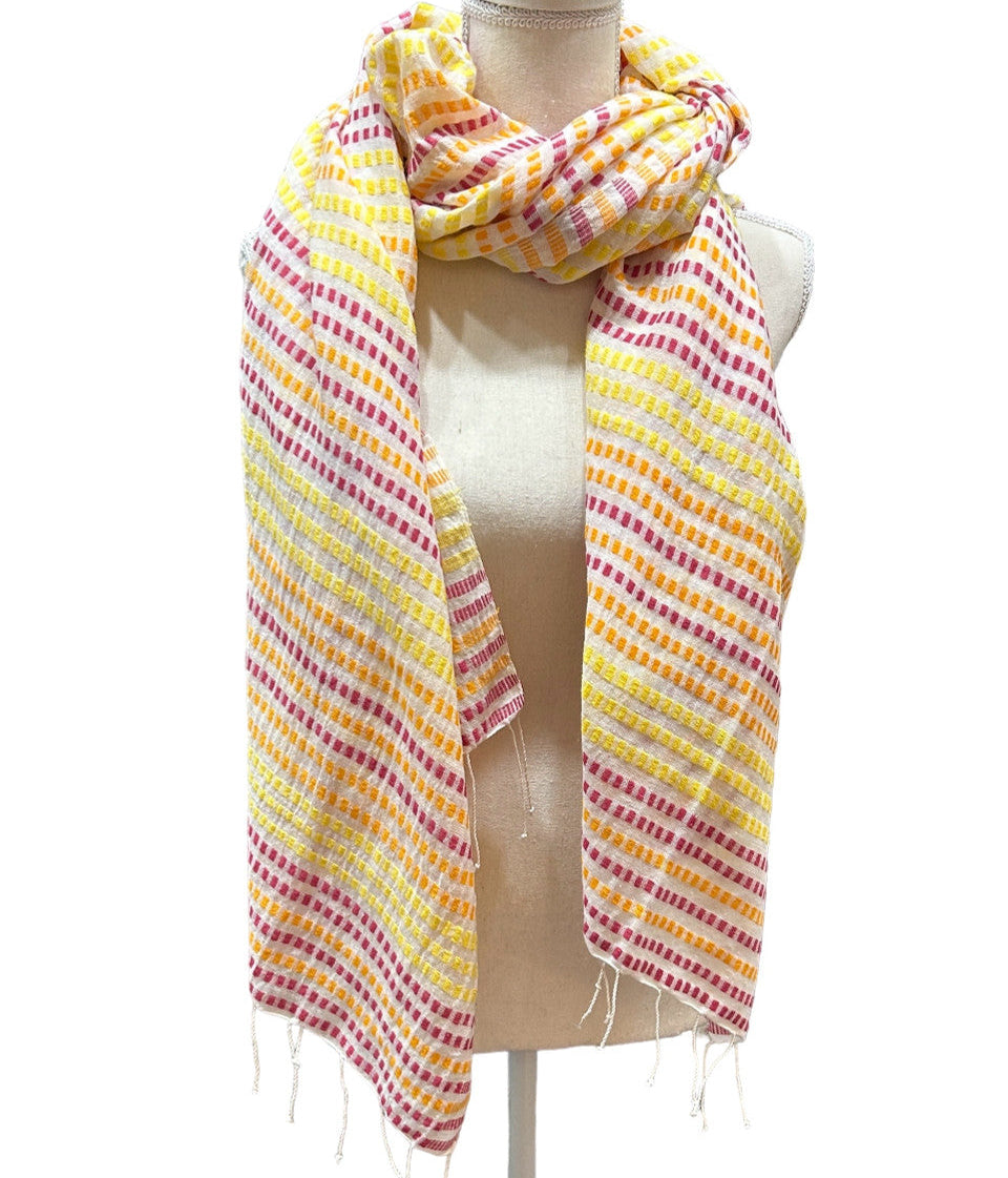 Beautiful handwoven cotton scarf from the Gamo people in the southwester mountainous region of the country. This group trains women on pit looms who historically have been relegated to menial labor. This project is committed to zero waste utilizing all fragments of the process. Organically dyed, Hand wash.