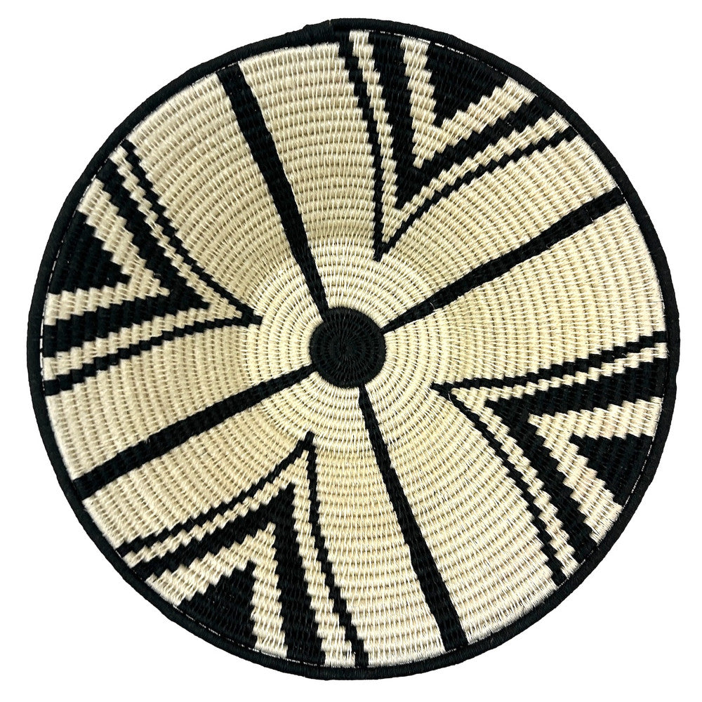 top view Handwoven Natural Fiber Basket Eswatini Handwoven natural fiber basket made with natural sisal from sustainably harvested sources. This is from a small artisan organization that has been working in Eswatini (Swaziland) since 1985. Very sturdy. Beautiful on the table or on the wall. Colors: cream and black