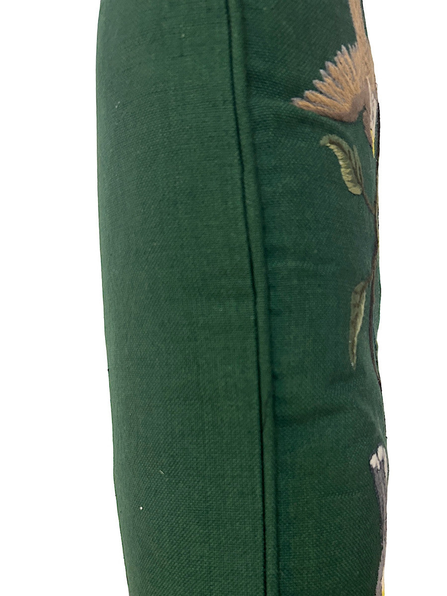 side view Handwoven cotton pillow with embroidery by Jose Sicay of Santiago Atitlan. The embroidery is done with a zigzag sewing machine. Jose is a master at free hand embroidery. The front fabric is handwoven forest green cotton . The piping and the back are the same forest green. Colors of embroidery: greens, brown, taupe, brick, sky blue, violet, yellow, grey  and more. Allow for variations in the colors as each pillow is one of a kind.