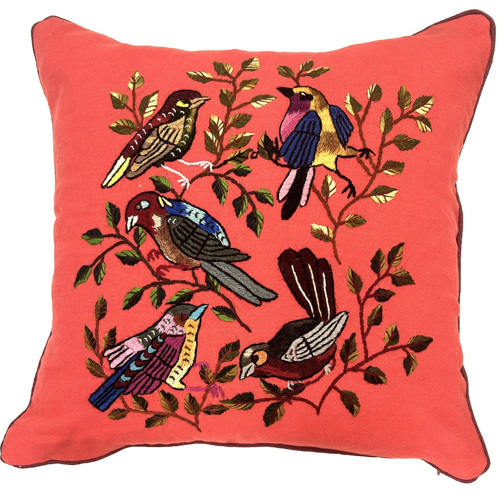 he pillow handwoven peachy pink colored cotton cloth.  Each bird is unique-so allow for some variations. The back and hand rolled piping are  a burgundy colored linen cloth. The birds are many bright colors with a black outline. The branches and leaves various greens and browns with some burgundy. Hidden zipper with 90-10 feather/down pillow insert.