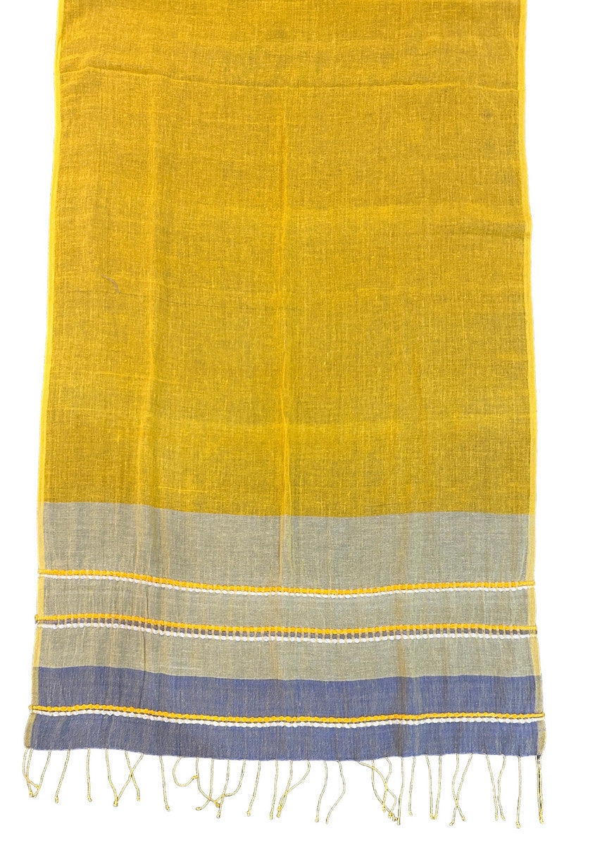 Beautiful handwoven  cotton scarf from the Gamo people in the southwester mountainous region of the country. This group trains women on pit looms who historically have been relegated to menial labor. This project is committed to zero waste utilizing all fragments of the process. Organically dyed, Hand wash. 