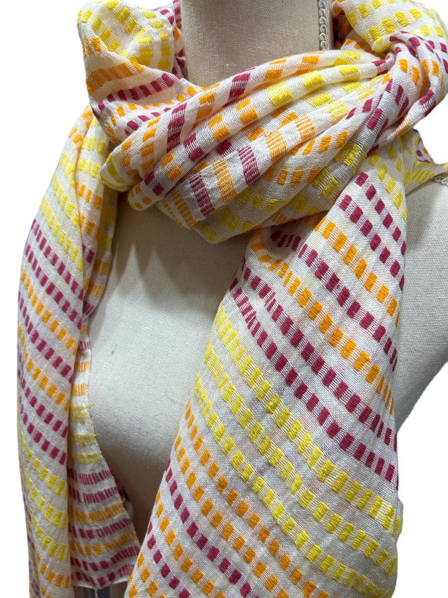 Beautiful handwoven  cotton scarf from the Gamo people in the southwester mountainous region of the country. This group trains women on pit looms who historically have been relegated to menial labor. This project is committed to zero waste utilizing all fragments of the process. Organically dyed, Hand wash. 